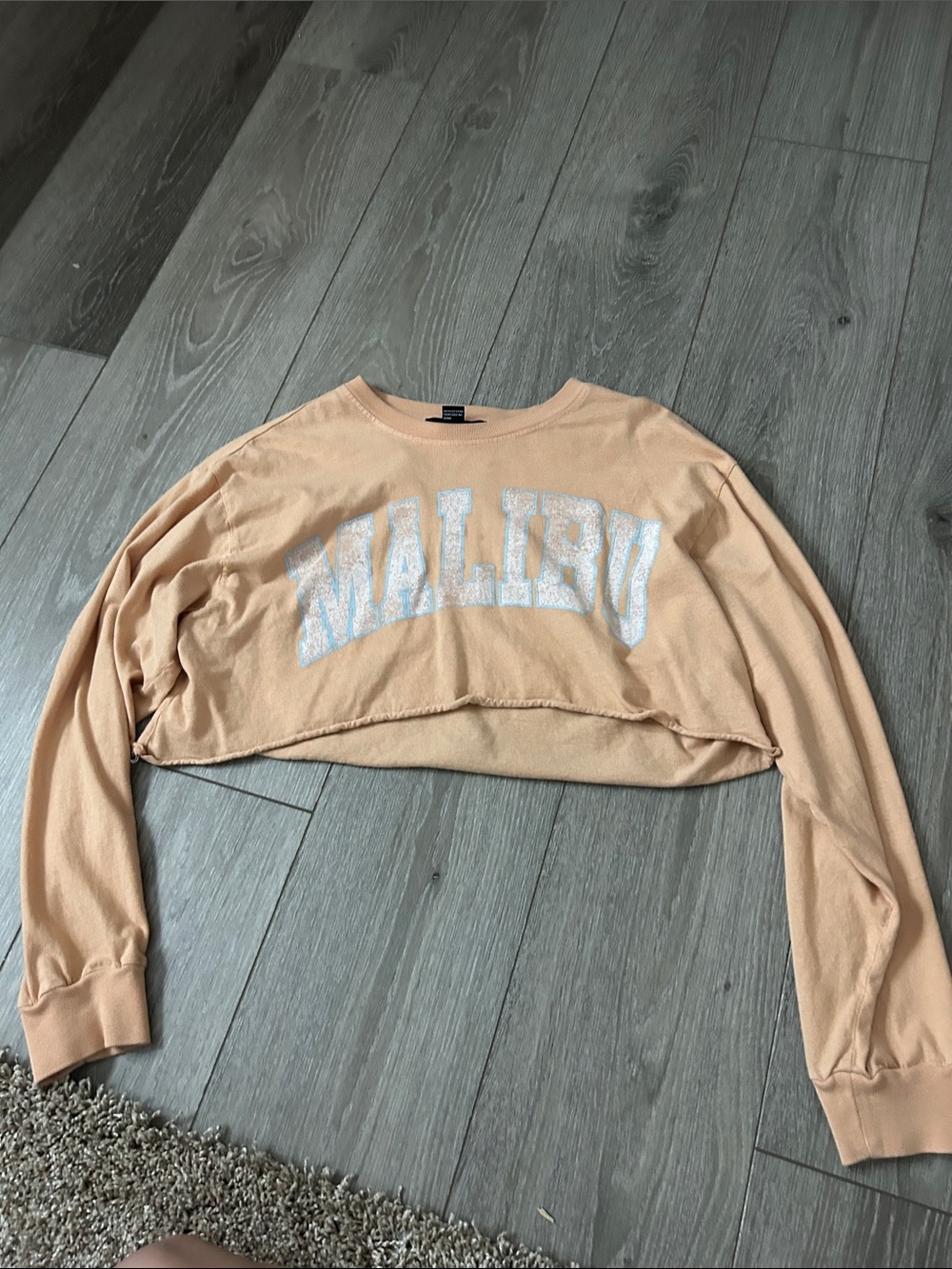 Forever 21 Peach Cropped Long-Sleeve Top with White Malibu Graphic